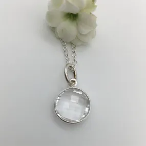 Gemstone necklace with clear quartz (rock crystal) crystal pendant on silver cable chain